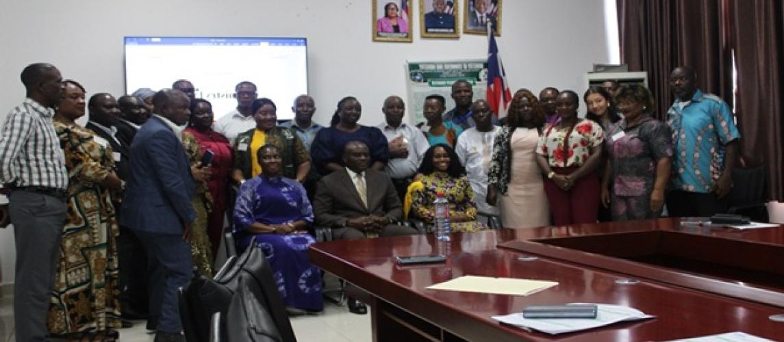 Participants pose for group photo