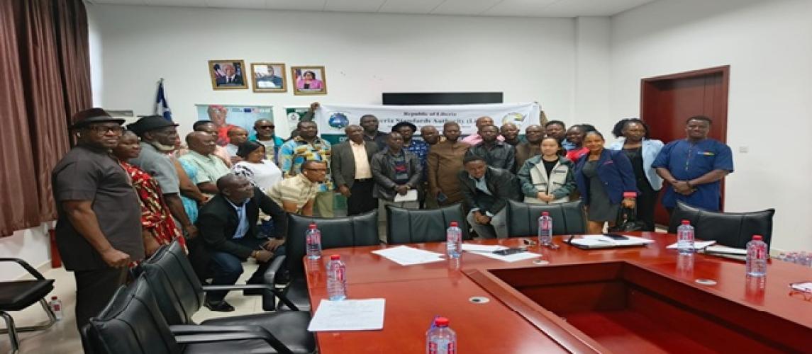 Participants pose for photo