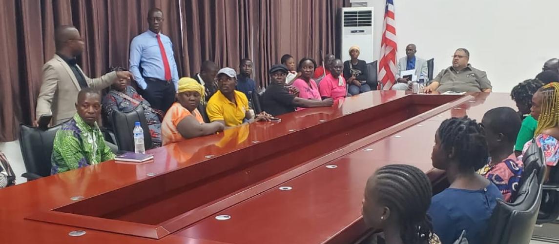 Commerce and Industry Minister, Amin Modad, addressing a group of Liberians living with disabilities at the EJS Ministerial Complex in Congo Town