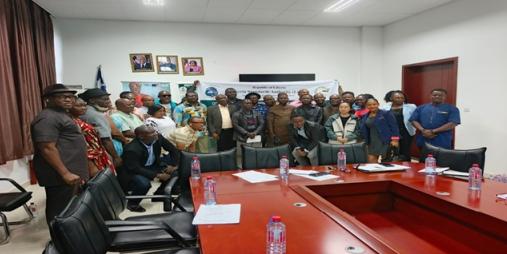 Participants pose for photo